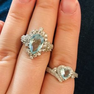 Two Aquamarine Rings (w cz’s)